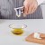 Wyciskacz do czosnku solidny stalowy z wyjmowaną wkładką Ikea Koncis - wyciskanie czosnku